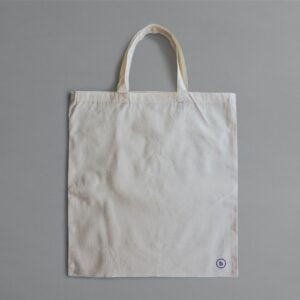 white reusable bag on gray surface