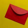 red paper on yellow surface