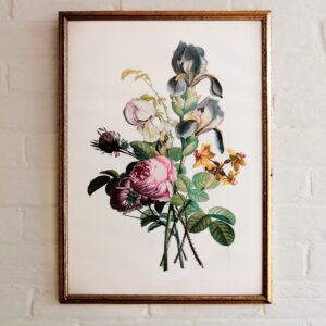 a picture of a bunch of flowers hanging on a wall